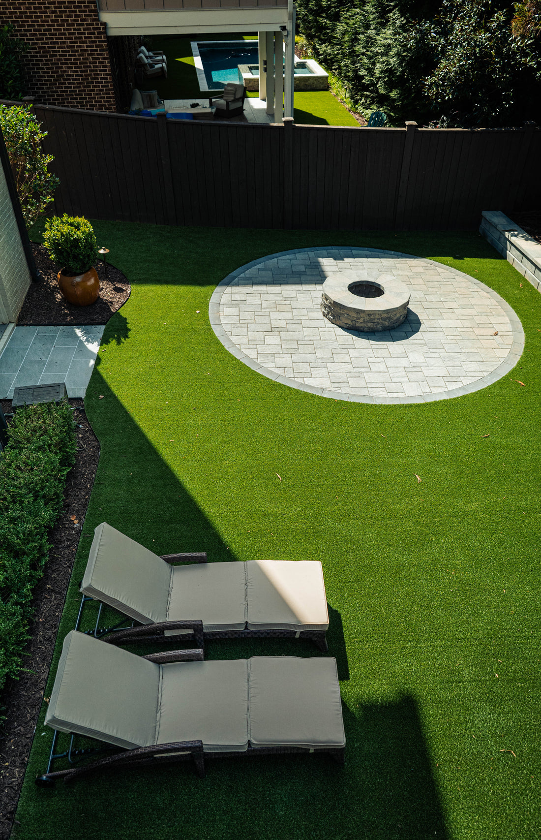 Low-Maintenance Backyard Ideas: How to Plan a Lawn Replacement With Artificial Turf